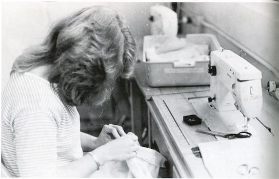 student using sewing machine 